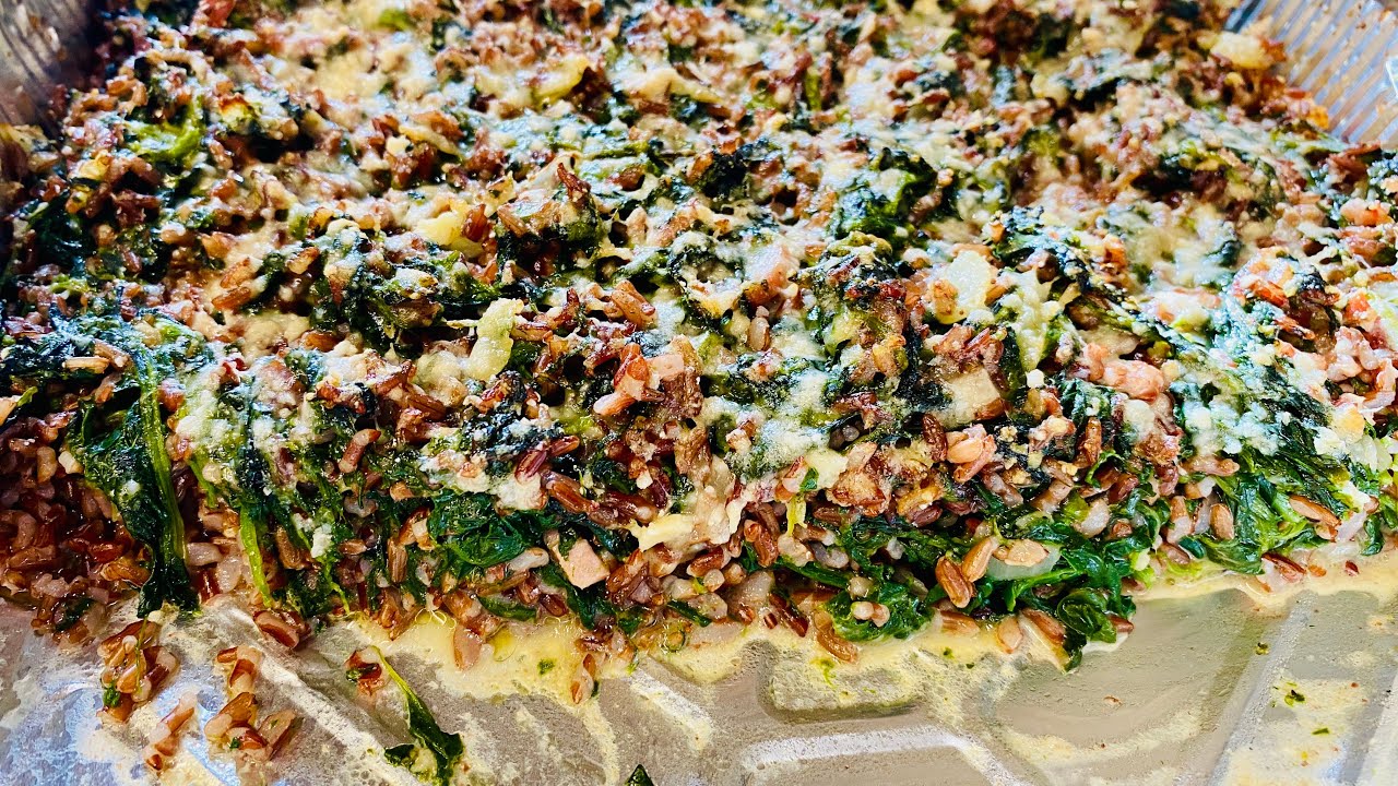Riso gratinato al forno con spinaci e parmigiano. una delizia. ￼