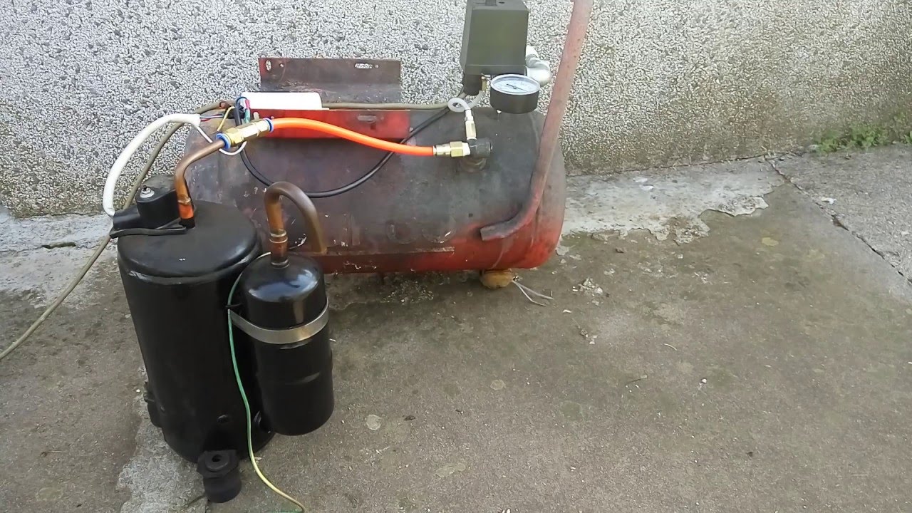 Homemade air compressor from an air conditioner