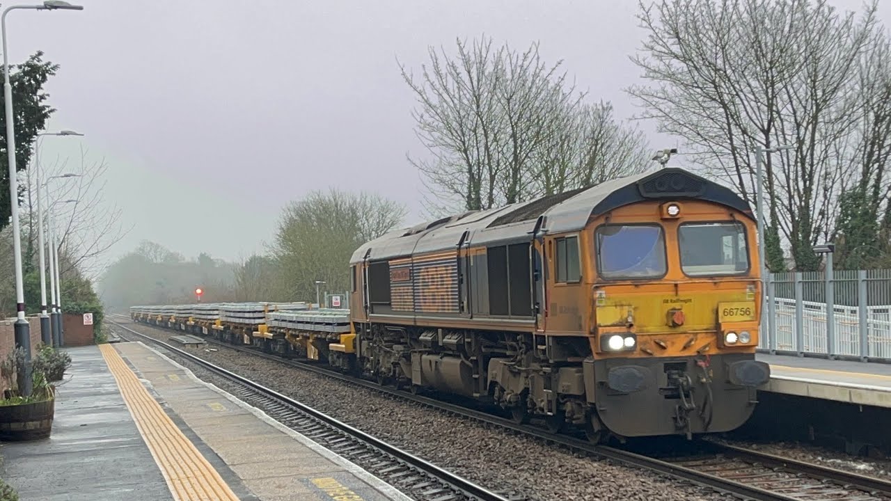 “Royal Corps of Signals” 66756 6E30 with 9 network rail flat wagons with concrete sleepers 30/1/2026