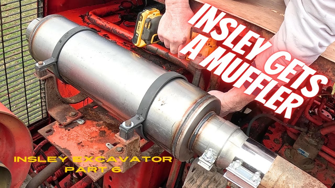 Installing A Muffler On The Insley Excavator