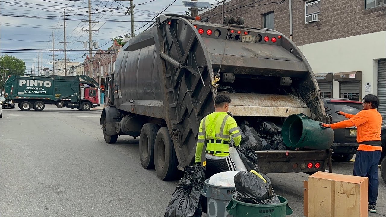 Black Mack MR McNeilus Rear Loader Garbage Truck Packing Nasty Trash