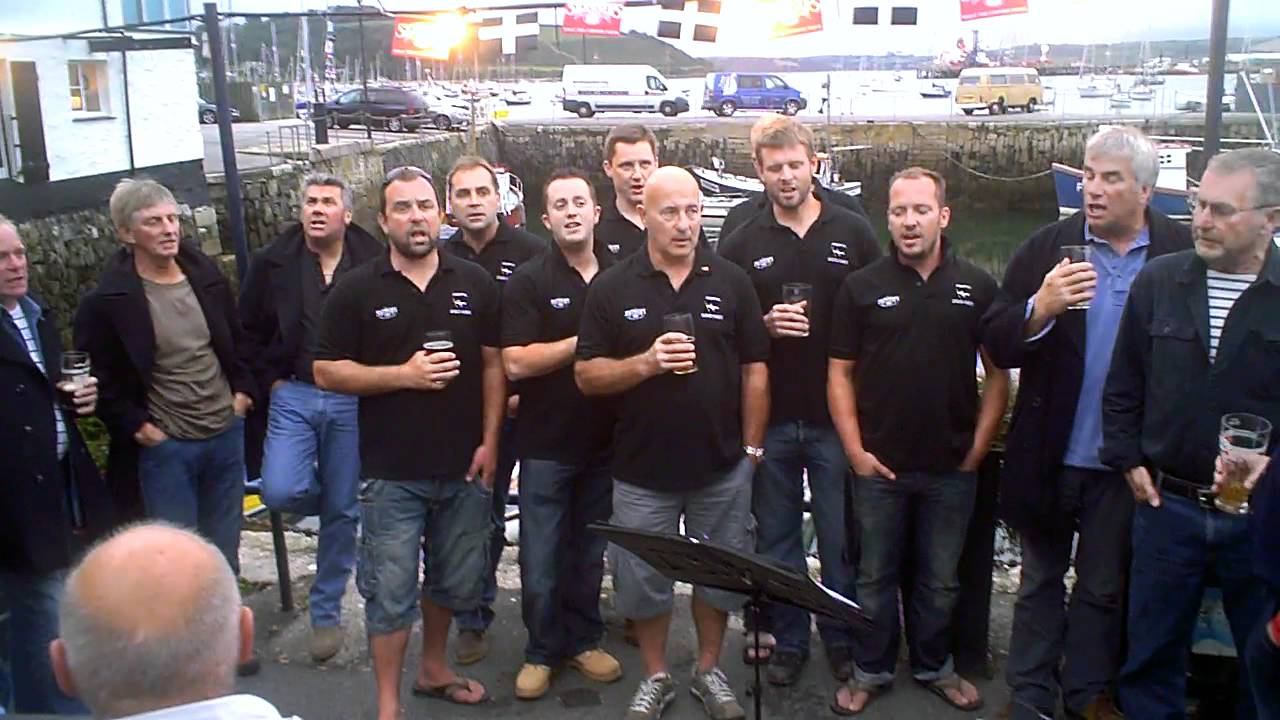 Fishermen's friends join The Aberfal Oggymen outside the Chain Locker Falmouth