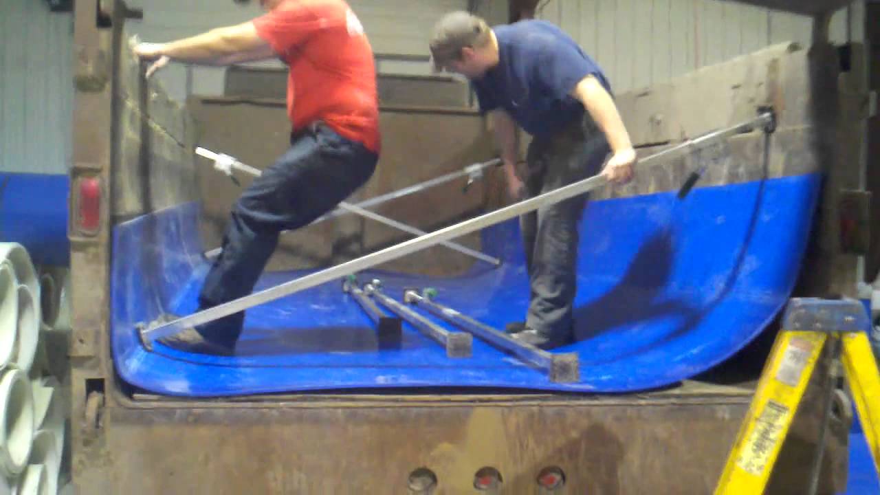 Fitting a Super-Slide UHMW Blue Iron liner to truck with cargo jacks