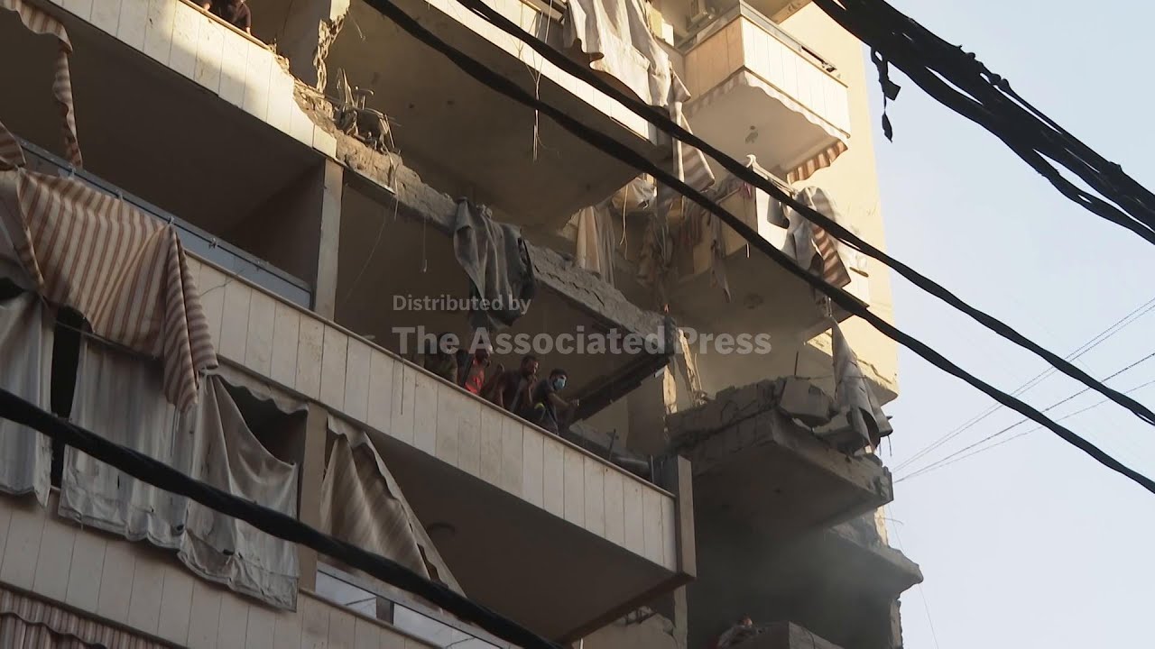 Buildings damaged as Israel says it targeted Hezbollah militant in first attack in Beirut in months