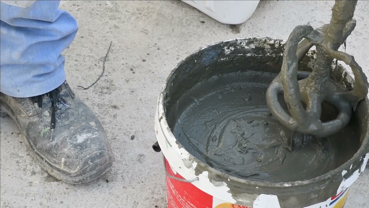 أديكور E2 عازل أسمنتي من مركبين لعزل مياة الأمطار من كيماويات البناء الحديث