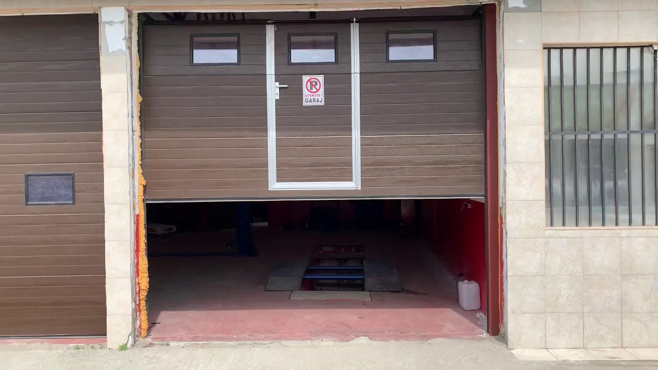 Usa garaj sectionala cu usa pietonala - 0764358811