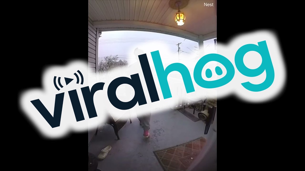 Woman Slips Down Icy Steps || ViralHog