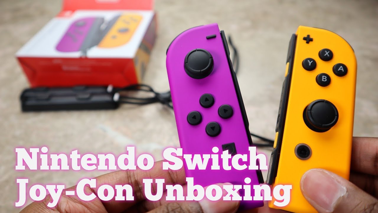 Nintendo Switch Joy Con Purple and Orange Unboxing