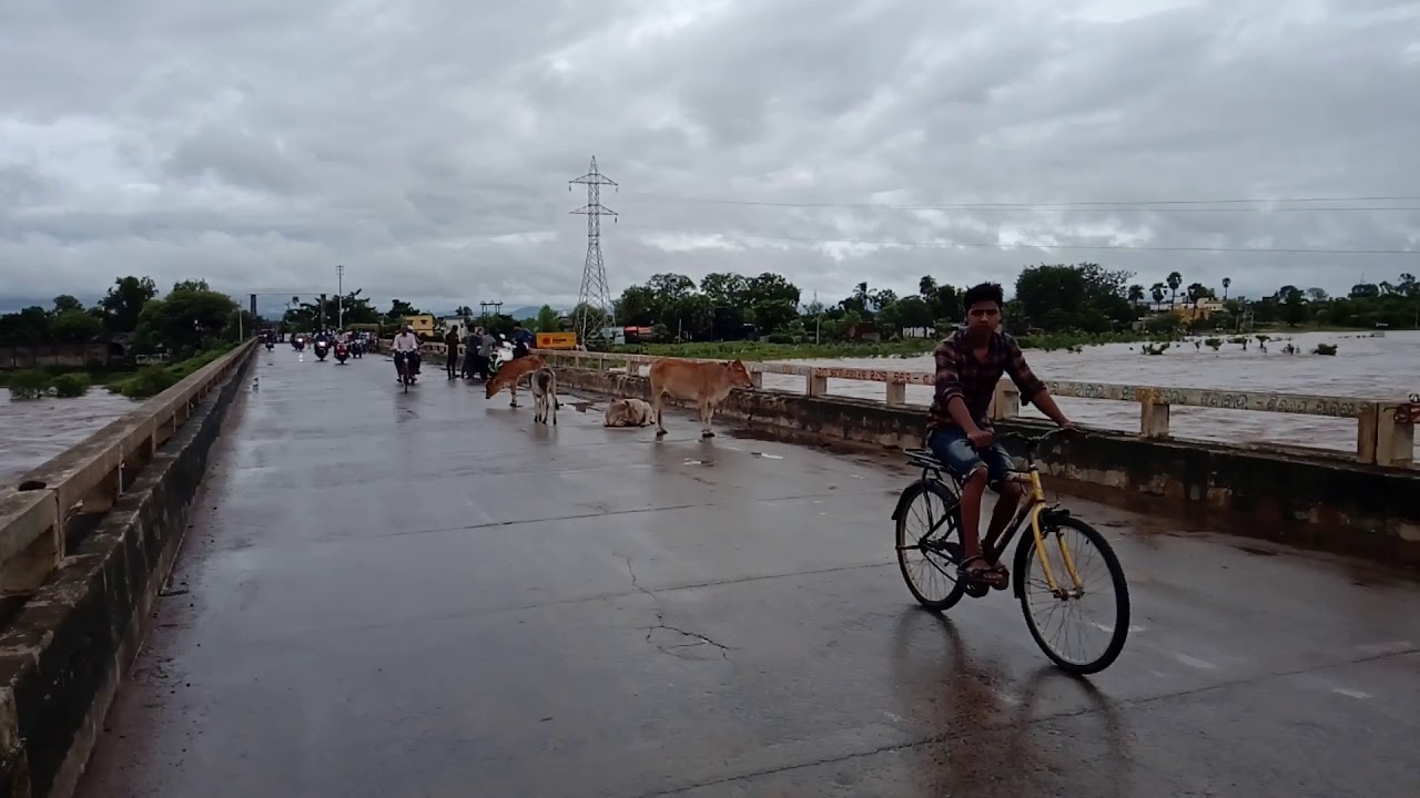 Manamunda tel river flood scene via bridge