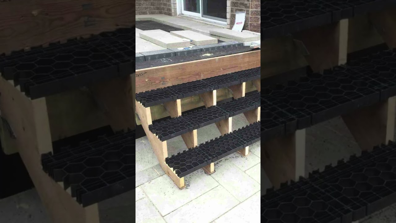 Outdoor Kitchen + Hot Tub on Concrete Paver Deck