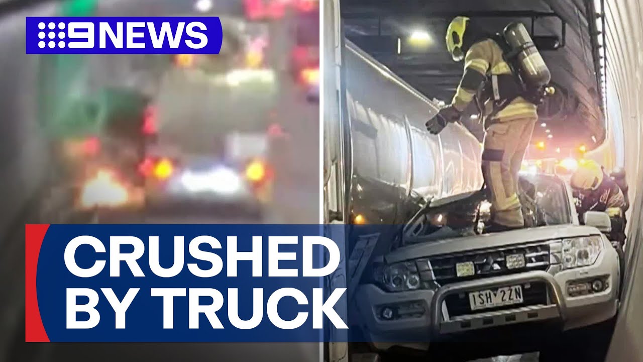Driver escapes after fuel tanker crushes SUV against tunnel wall | 9 News Australia