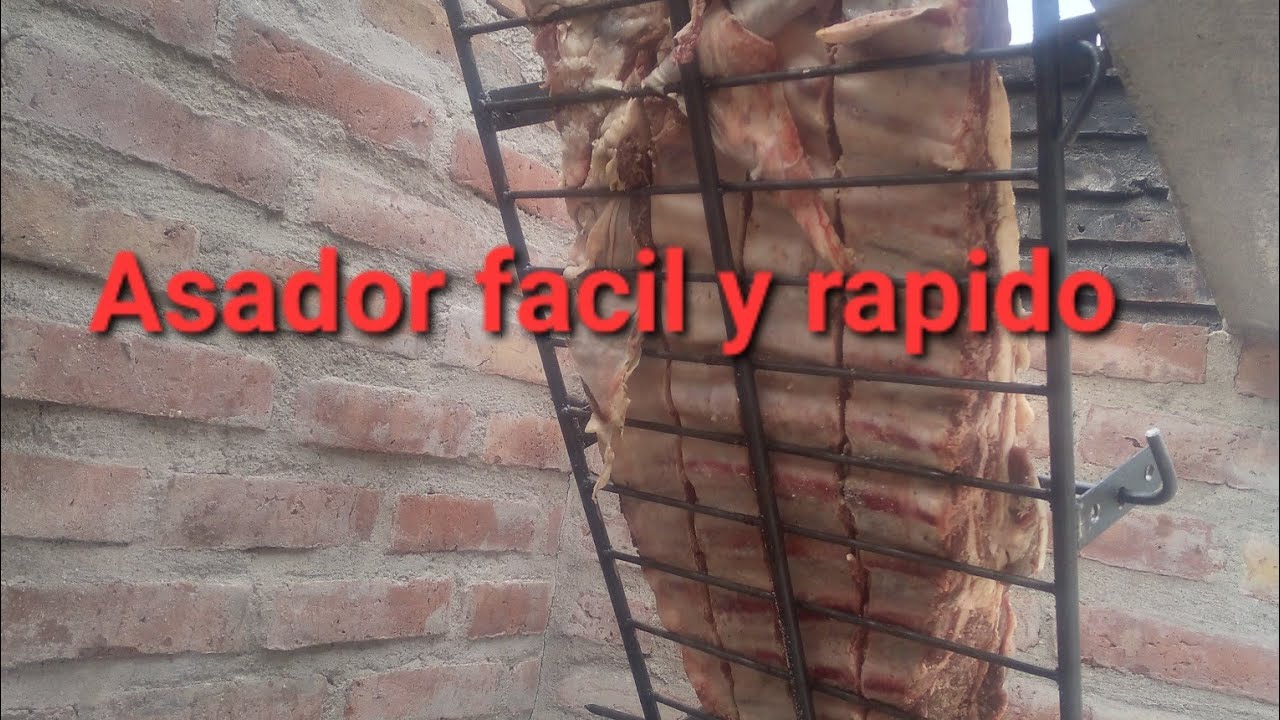 Asador en cruz  . librito . a la estaca M³metal y madera