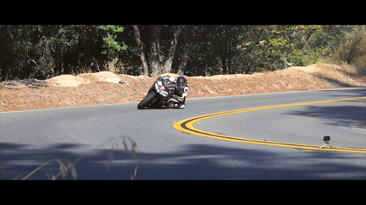 Side Show-2 Yamaha R1 power sliding in the canyons with dunlop race rubber