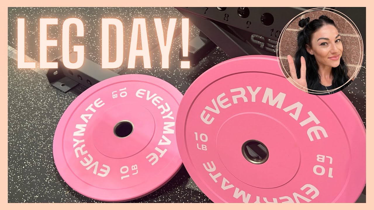 Pink bumper plates for at home garage gym