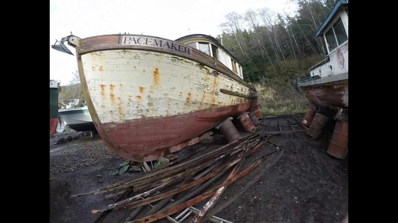 Alaskan wooden boat graveyard