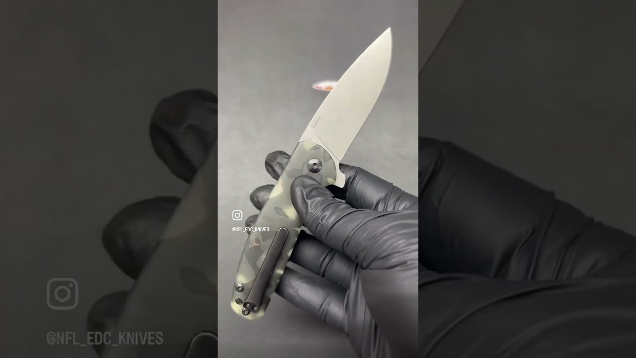 Kizer -  Ray Laconico Gemini Folding Knife with Raffir Noble scales. GITD