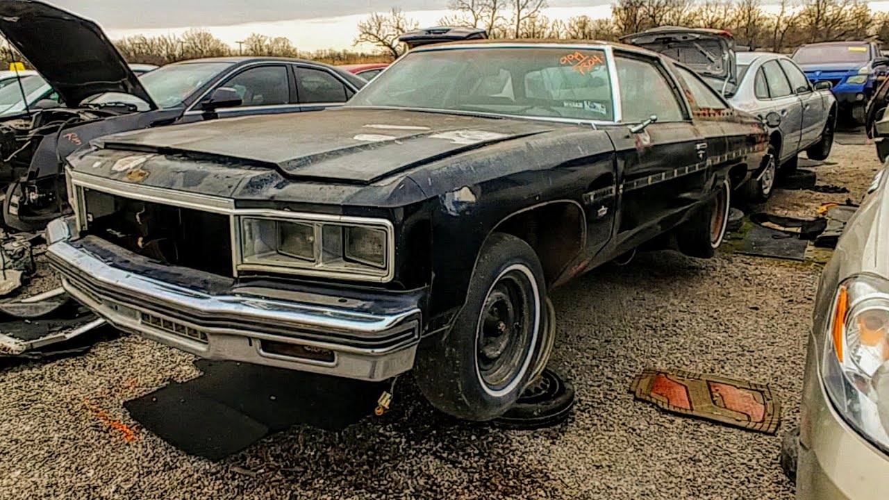 Rare sight in the yard. Glass House 1976 Caprice Landau Donk Junkyard Find