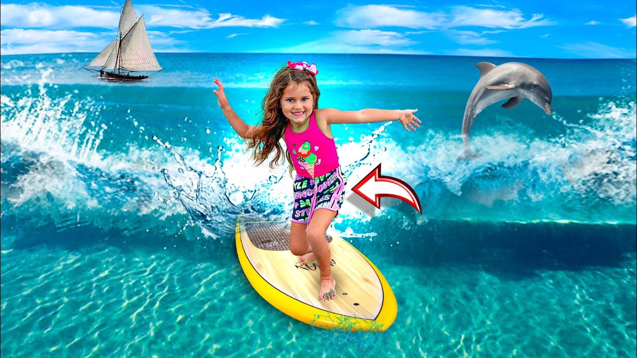 LAYRA APRENDE A SURFAR SOZINHA NA PRAIA!