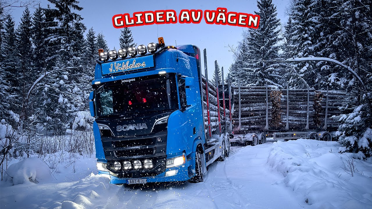 Kör av vägen lite med timmerbil. Gör ett försök till nästa dag. (prat om extraljus)