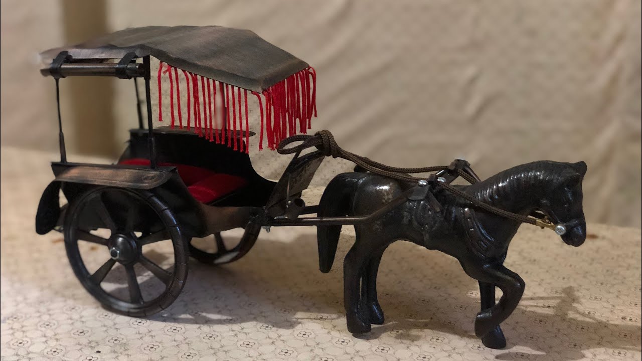 Miniatur delman ( kereta kuda )