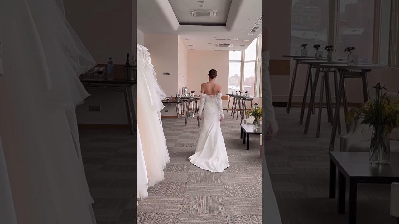 Fashion-Forward & Feathers! Elegant Fitted Wedding Gown By Papilio Boutique. #weddinginspiration