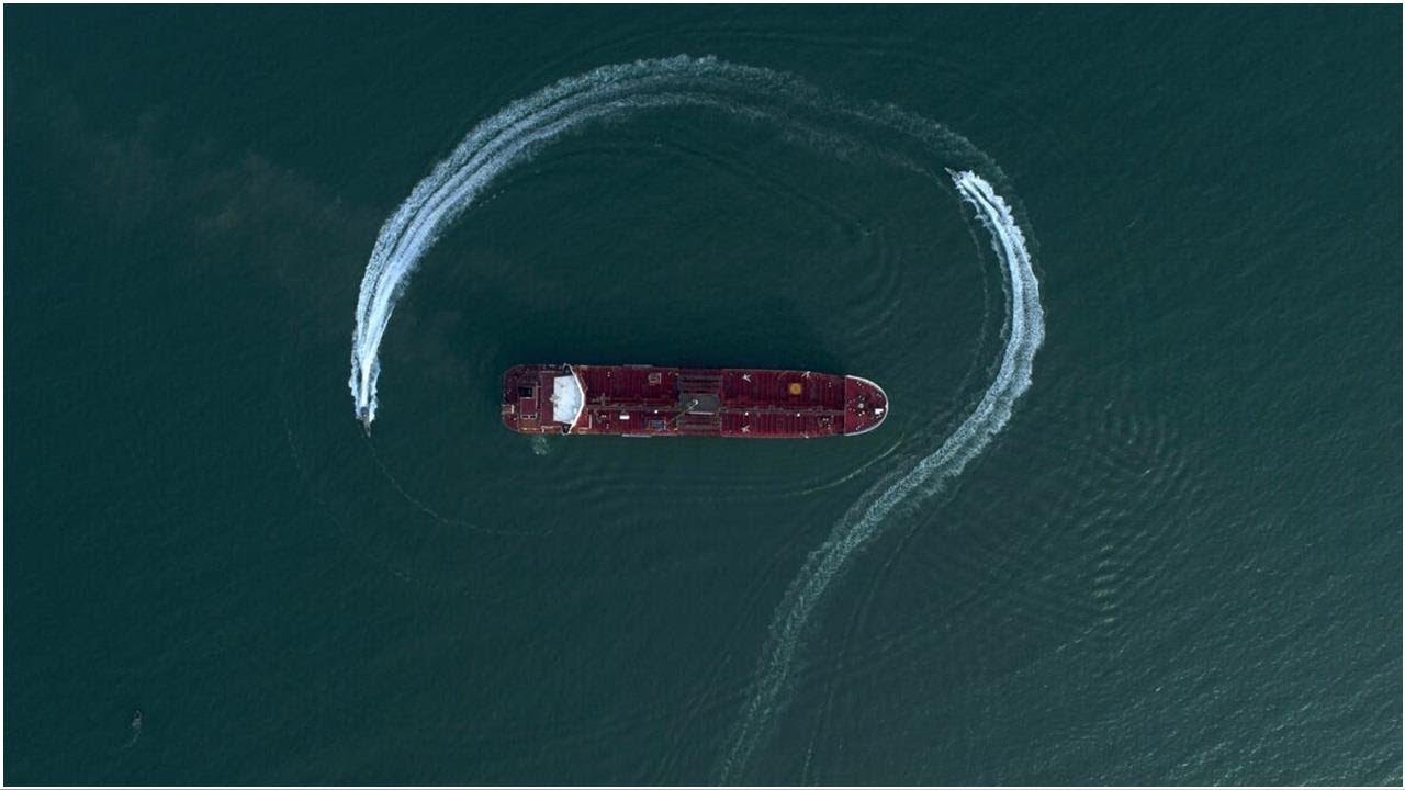 How an Iranian oil tanker is evading U.S. sanctions to ship 2.1 million barrels to Syria | CBC Ne...