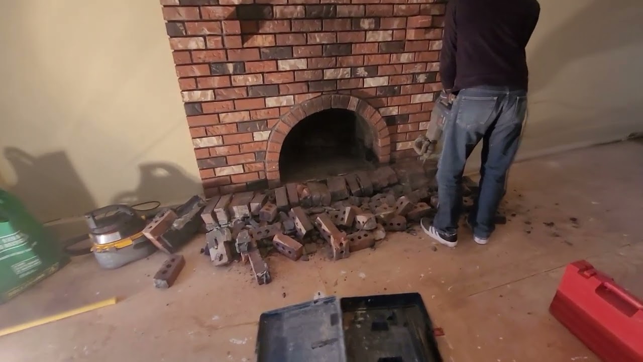 demolition of a brick fireplace using a hammer drill..in 3 mins