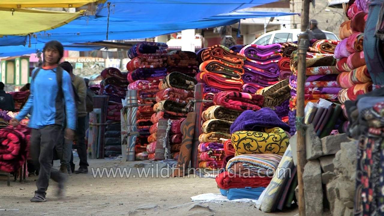 Colourful blankets and woollens being sold at local market in Leh