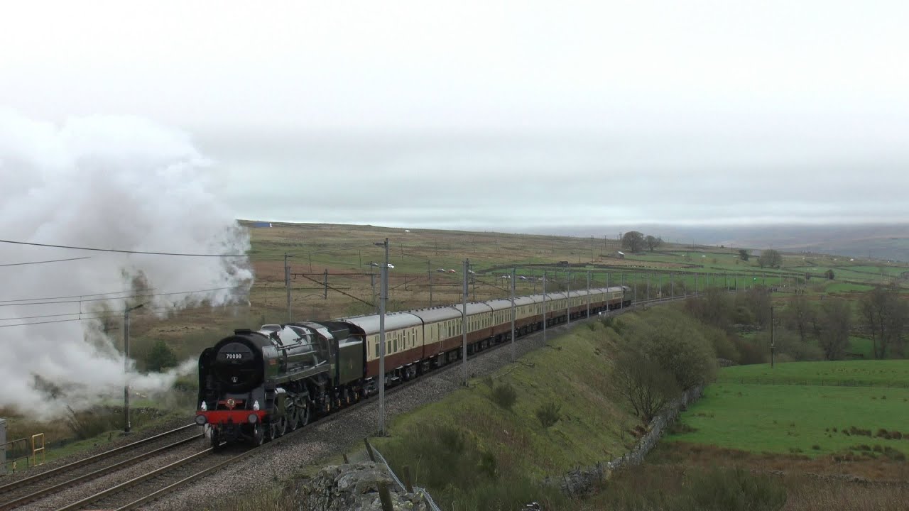 70000 Britannia attacks Shap from a standing start at Tebay on the Lakelander 13/5/24.