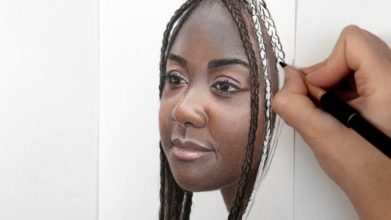 Coloring a realistic portrait with colored pencils
