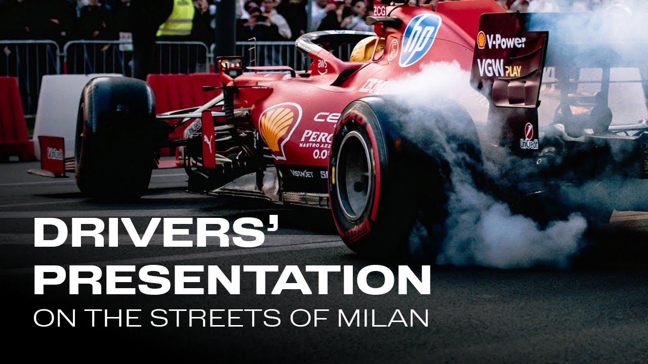 Lewis and Charles driving TOGETHER on the streets of Milan