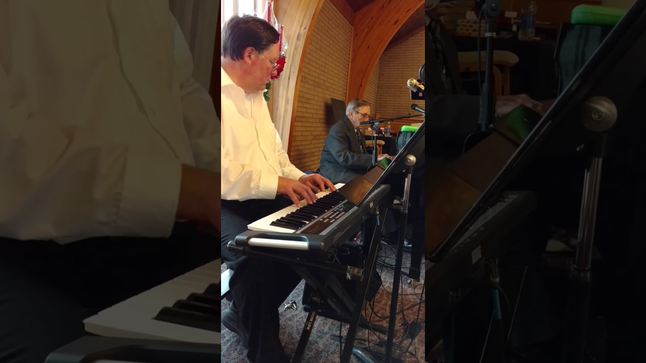 Andy and Tom playing music in church
