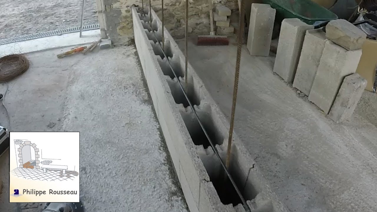 Mur beton banché en bloc a bancher - ancrage sur dalle beton