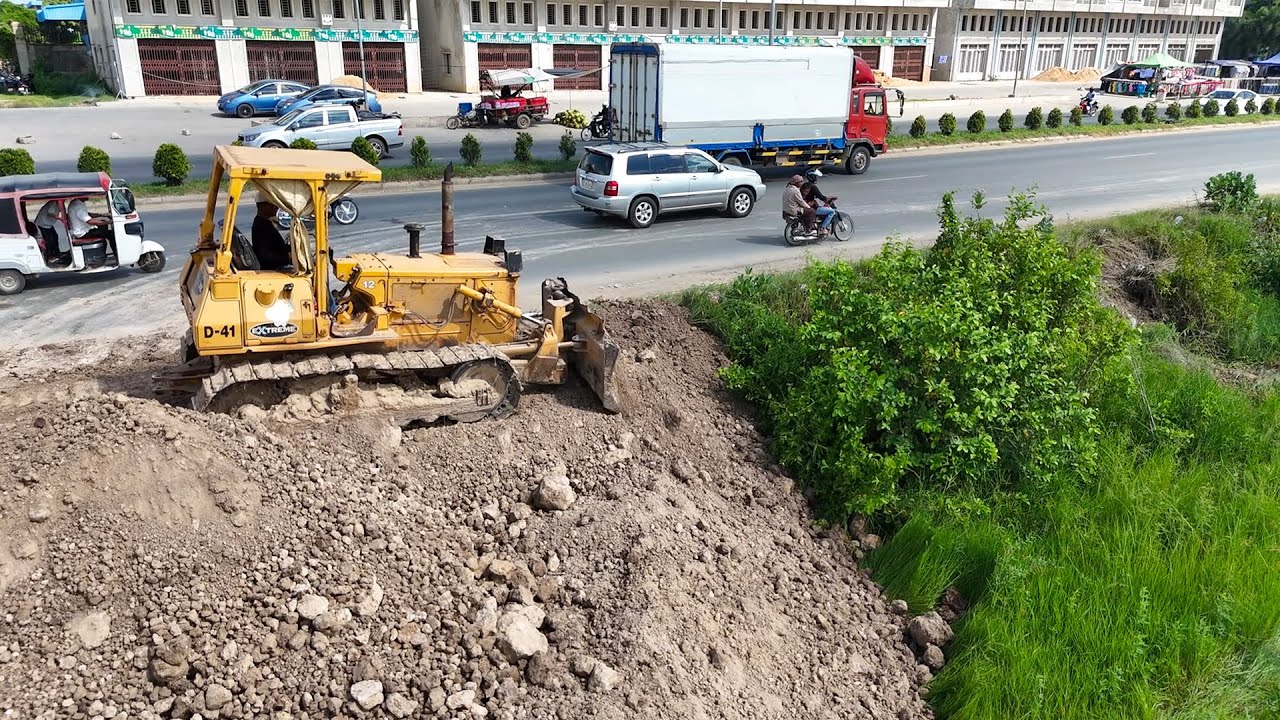 Great bulldozer Komatsu D41 starts new huge project with 30ton dumper