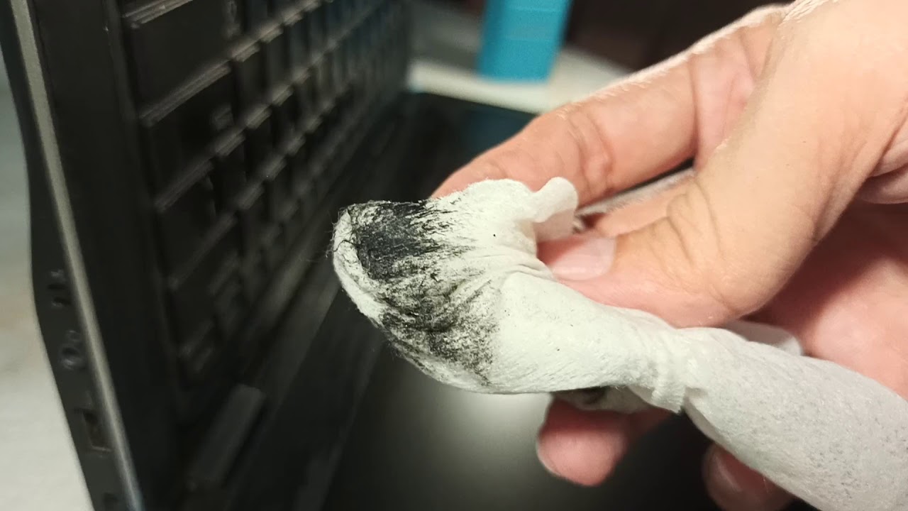 Relaxation: Removing Sticky Rubber Coating From A Laptop (How to)