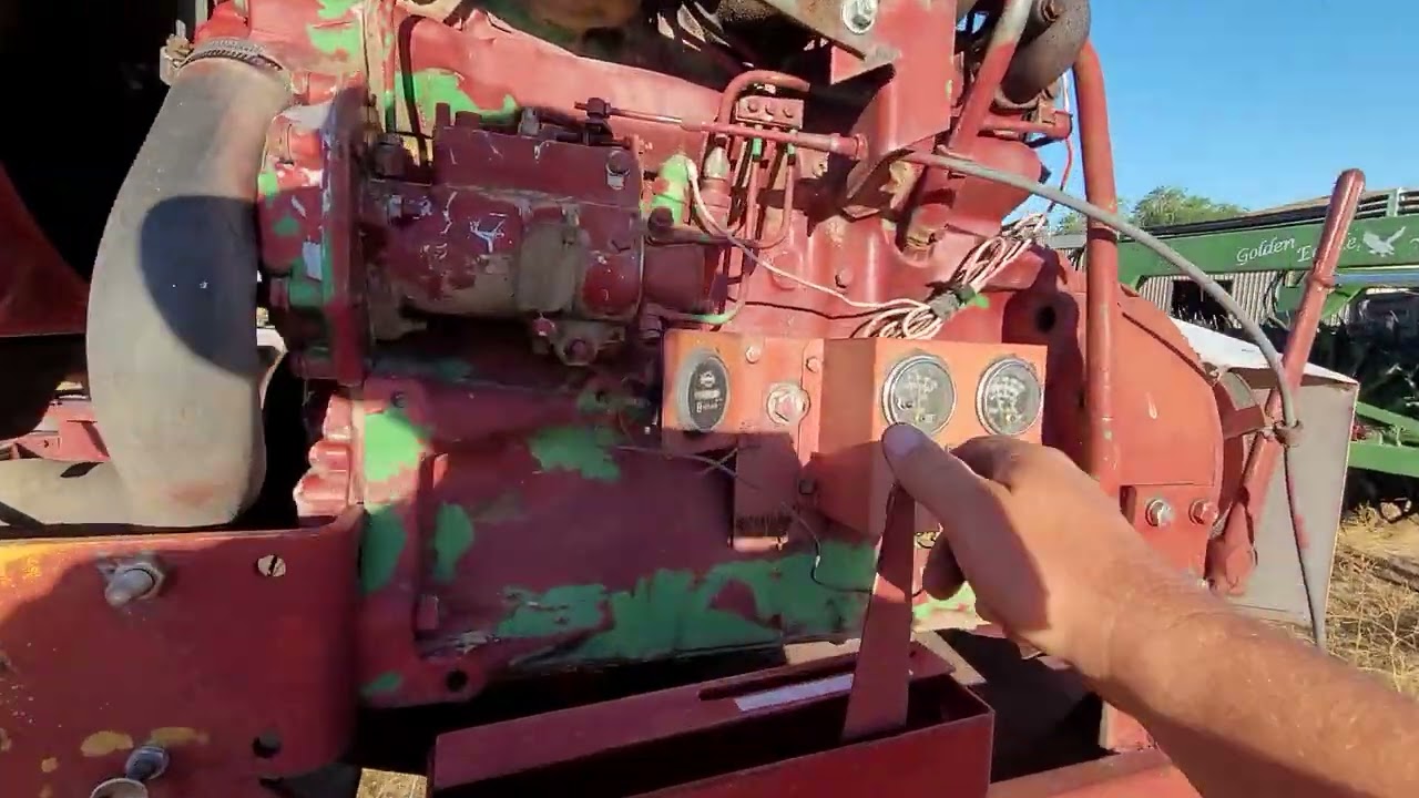 Freeman 330. John Deere engine conversion and hydraulic hay saver.