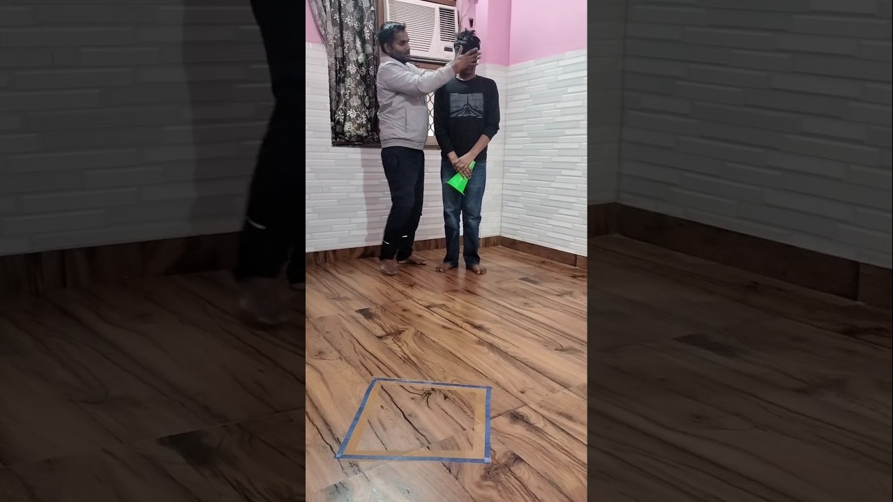 Place the cone in the box game challenge blindfolded  