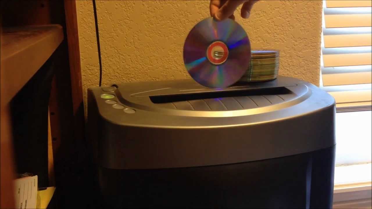 Shredding a pile of old CDs and DVDs