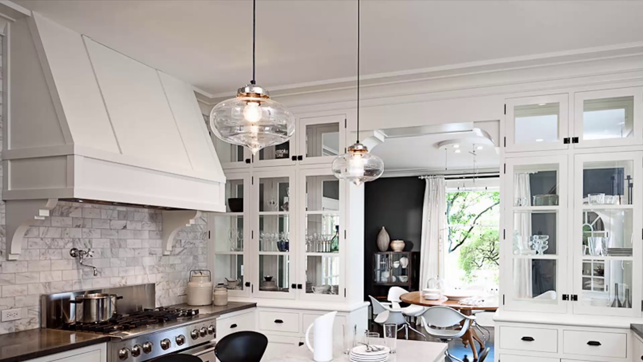 Two Pendant Lights Over Dining Room Table