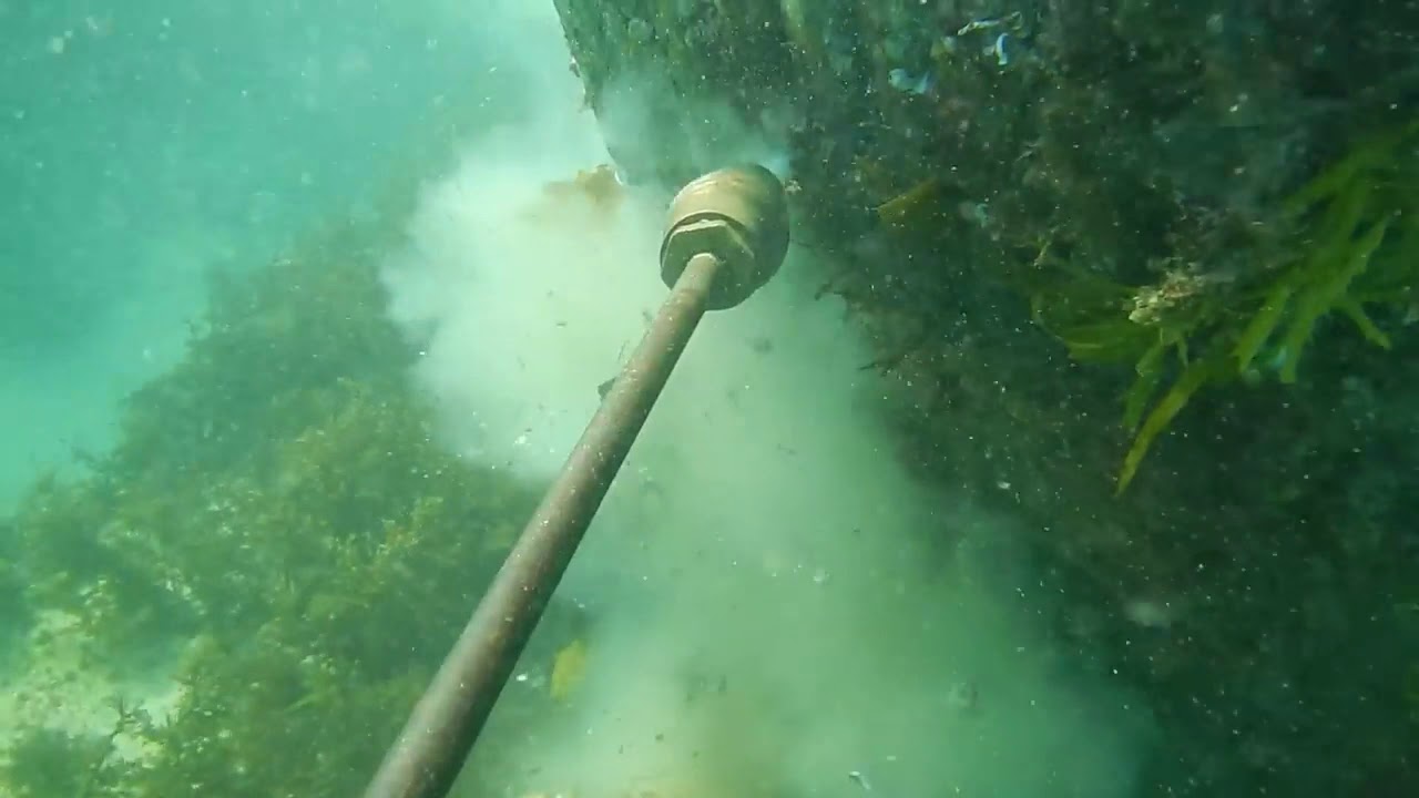 WOW...Cleaning high pressure water blasting in underwater.