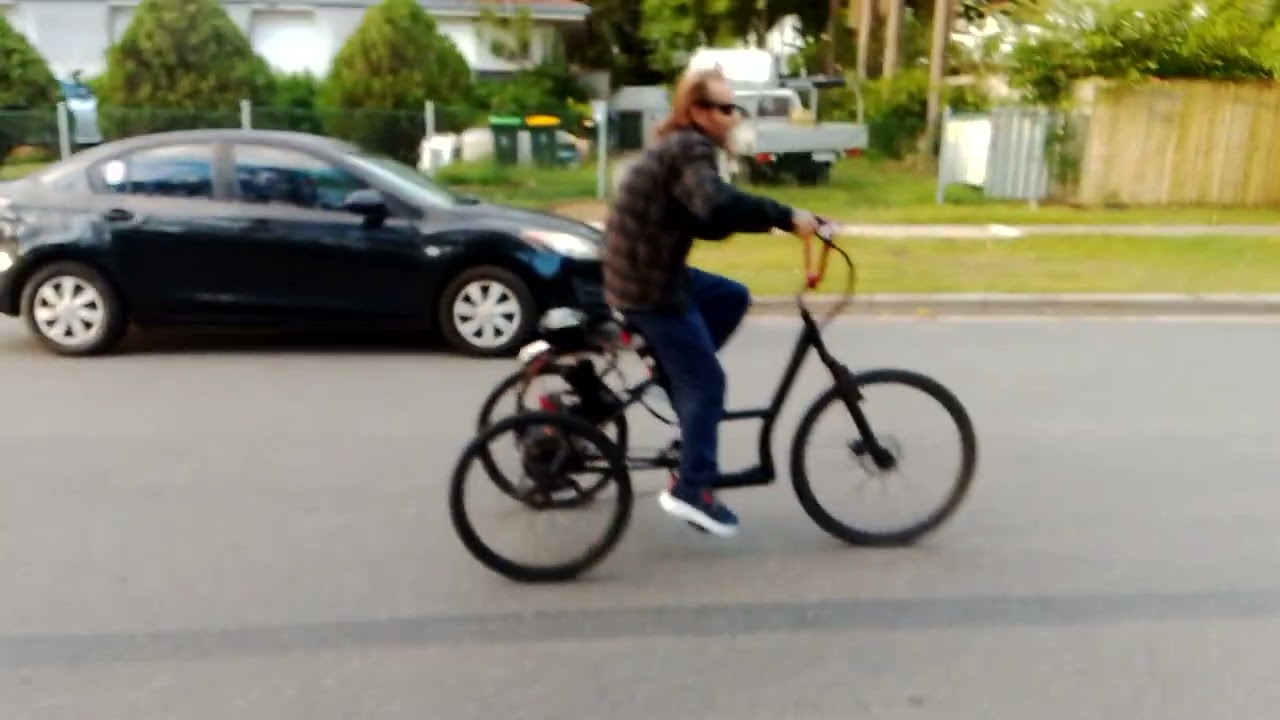 Petrol engine pedal trike is terrifying fun