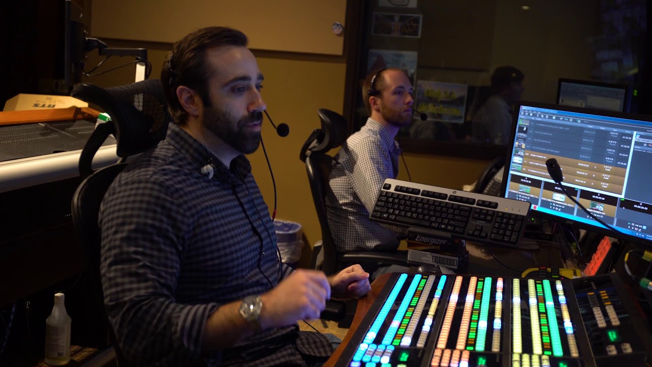 Behind the scenes live tv director, in the control room