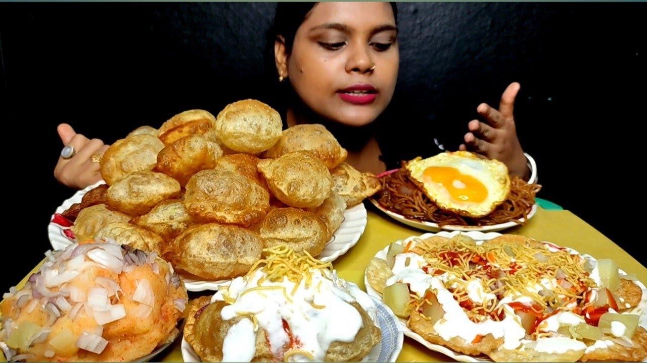 eating show Raj kachuri, dohipuri, panipuri, soupy noodles and sunny side-up egg pouch..   BIG BITES