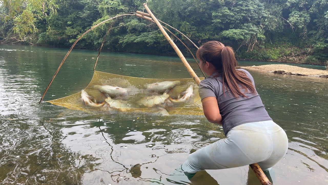 The Girl Fishing on Rivers and Lakes By Fishing Net, Traditional Fishing, Catch Many Fish