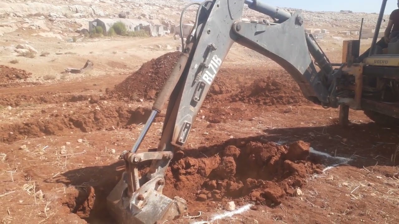 حفر قواعد بناء لودر حفار فولفو LB71