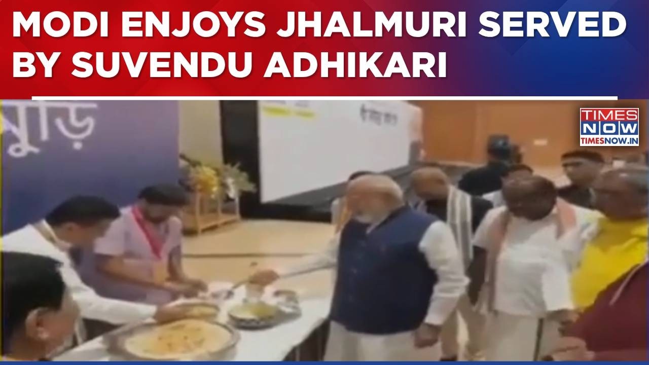 PM Modi Enjoys Jhalmuri Served By West Bengal CM Suvendu Adhikari At NDA Meeting In Delhi | WATCH