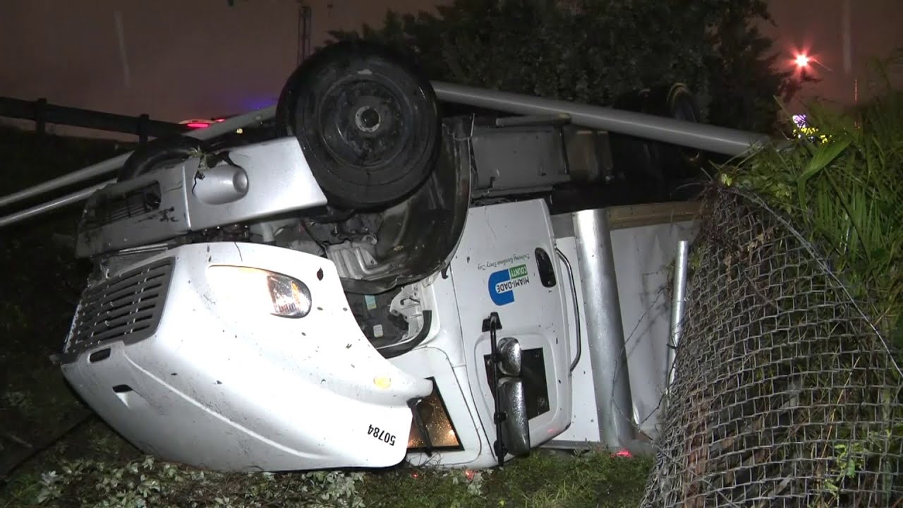 Residents help Miami-Dade County driver after crash off I-95