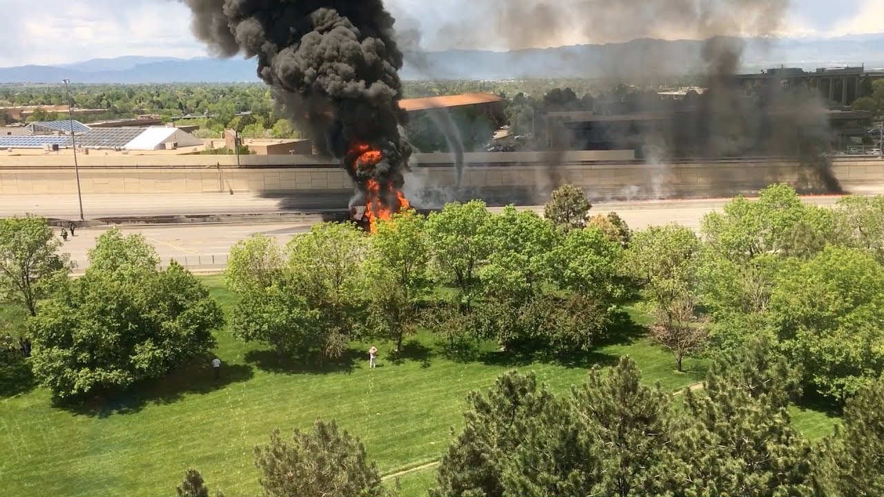 RAW: Bystander films man jumping from fuel tanker as it explodes into flames