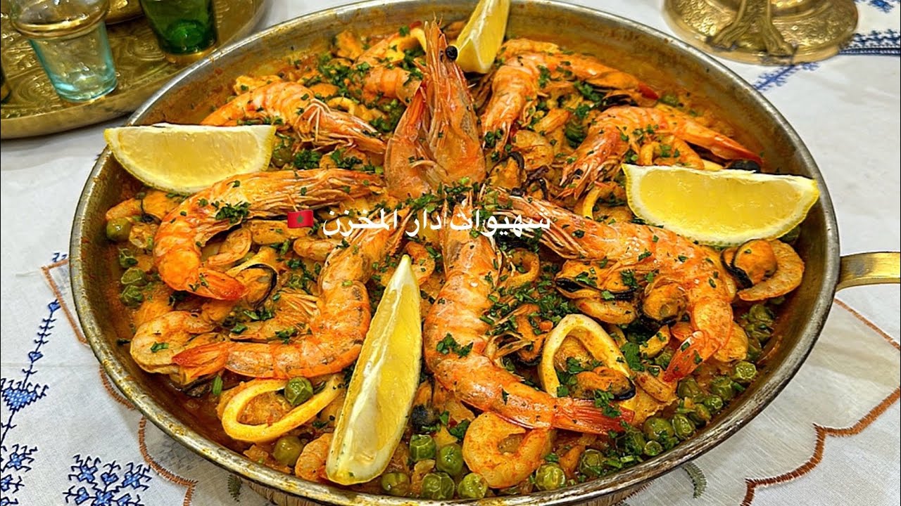 پايلا الأندلسية من قلب إشبيلية بكل أسرار النكهة والبنة المميزة وطريقة الحصول على أرز الحبة وختها