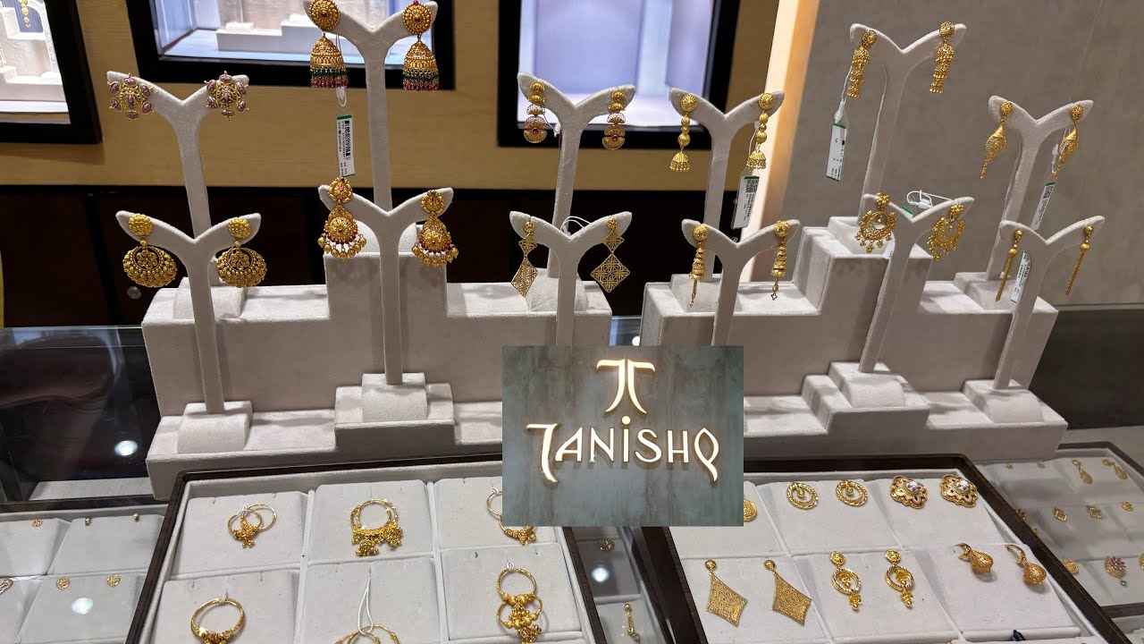 Tanishq trendy and modern gold earrings designs with price and wt 
